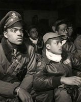 Members of the 332nd Fighter Group (Tuskegee Airmen) attending a briefing in Ramitelli, Italy, March 1945. Source:  Toni Frissell Photograph, Public Domain, available at http://www.flickr.com/photos/trialsanderrors/3385952500/